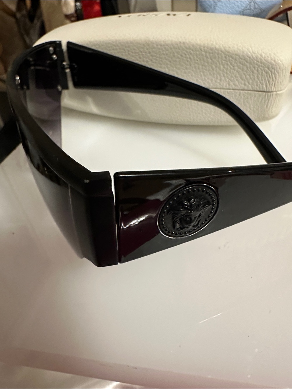 Black Oversized Shield Sunglasses with Embossed Medallion